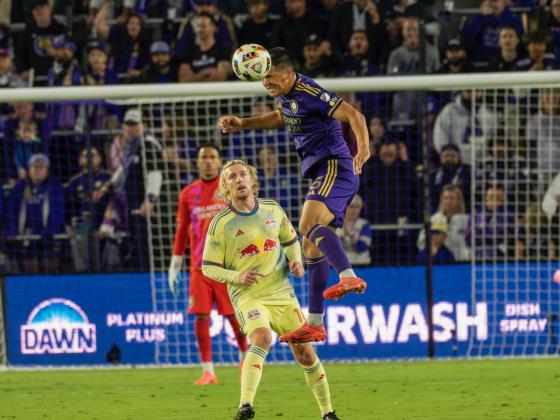 Cesar Araujo wins a header in a tough match in which Orlando City loses in the Eastern Conference Finals. PHOTO/MARIO CASAMALHUAPA