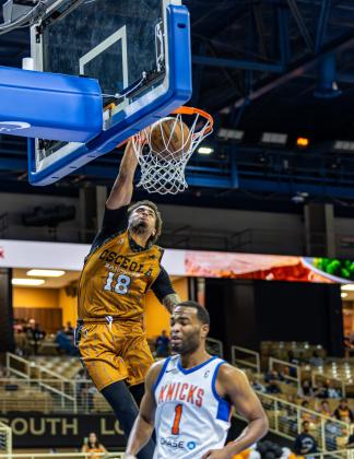 Jaylon Slawson throws down a slam in the Osceola Ranchers' 119-111 win Thursday over the Westchester Knicks. PHOTO/TAYLOR MCFEE