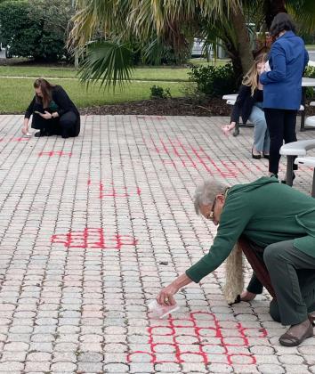 A Red Sand ceremony was held after the event as a symbol that no child should fall through the cracks. PHOTO/TONI ROWAN