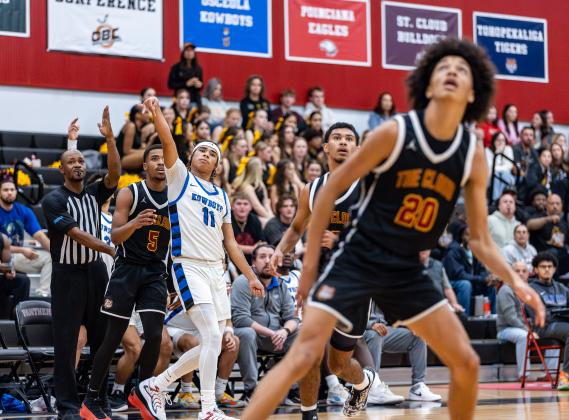 Count it: Osceola's Jordan Isaac puts up a shot. PHOTO/TAYLOR MCFEE