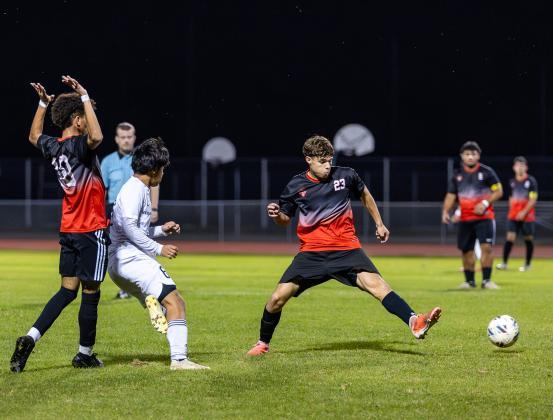 Gateway's Joseph Ramirez (23) plays the ball in the midfield in the win over Leesburg. PHOTO/TAYLOR MCFEE