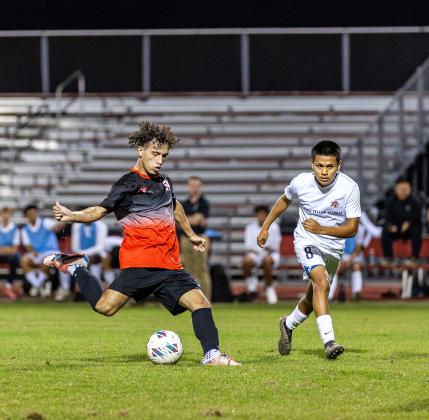 Gateway's Edgardo Vazquez fires on goal in Tuesday's 5-0 playoff win over Leesburg. PHOTO/TAYLOR MCFEE