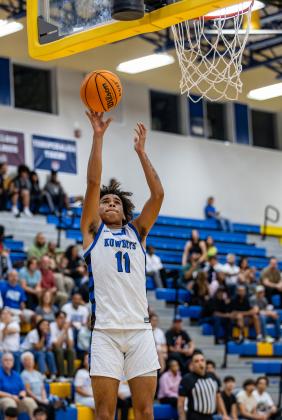 Osceola's Jordan Isaac goes to the rim for two of his game-high 32 points Friday. PHOTO/TAYLOR MCFEE