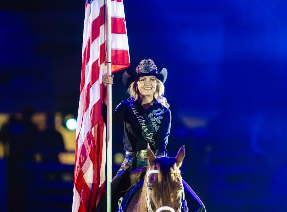 Miss Silver Spurs Bailee Jeannin got the rodeo off to a patriotic start. PHOTO/TAYLOR MCFEE