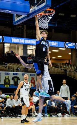 Mac McClung four perfect-score dunks were much more impressive than this one at the Silver Spurs Arena in November. See story for the details. PHOTO/TAYLOR MCFEE