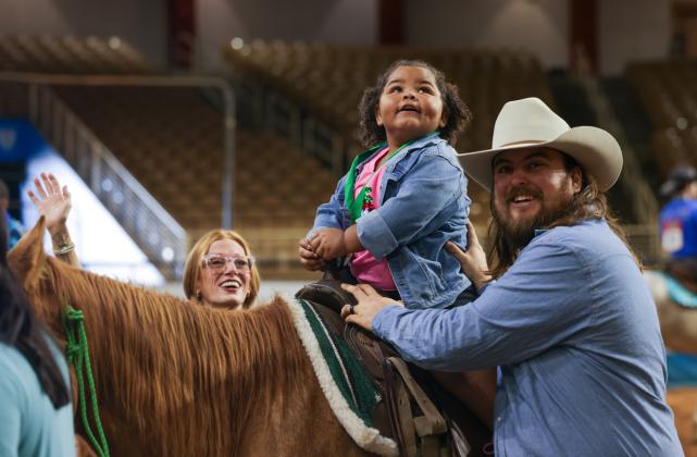 Sunday morning at the Spurs' gives way to the Special Needs Rodeo, where contestants, rodeo queens and other members take time to bring those with challenges into the rodeo ring. PHOTO/SILVER SPURS RIDING CLUB