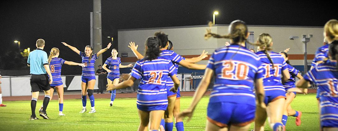 Celebrate! The Longhorns get their first ever win over Vero Beach Tuesday. PHOTO/KATIE WILLIAMS