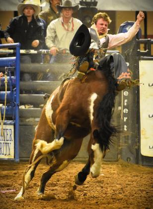 Hats off to the rodeo cowboys — like this bareback rider. PHOTO/KATIE WILLIAMS