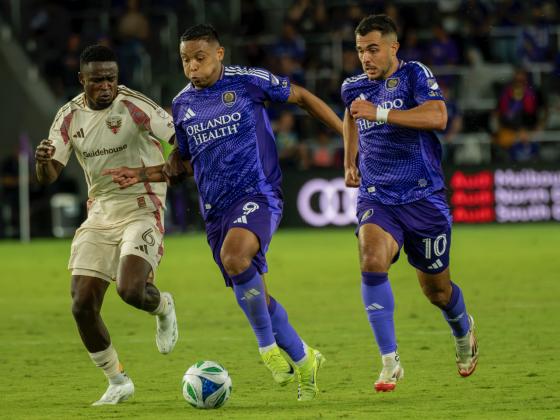 Luis Muriel and Martin Ojeda attack together. They both had goals to lead the Orlando City Lions over DC United 4-1. Saturday. PHOTO/MARIO CASAMALHUAPA