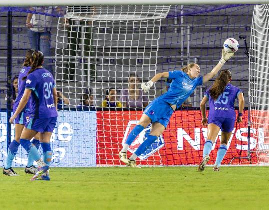 Orlando Pride goalie Anna Moorhouse pushes away a shot in Friday's 3-2 victory over Angel City FC. (Photo/Taylor McFee)
