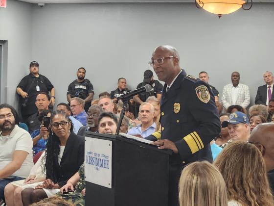 New Kissimmee Police Chief Charles Broadway addresses the City Commission after his swearing in Tuesday. PHOTO/KEN JACKSON