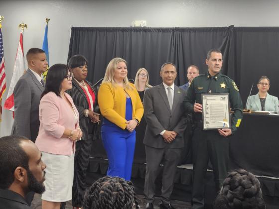 The Kissimmee City Commission presented outgoing acting Police Chief Robert Anzueto with a proclamation for his four months of service during a time of flux at Kissimmee Police Department. PHOTO/KEN JACKSON