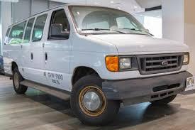 The 12 people were riding in a 2004 Ford F-350 van, like this one pictured. (Photo/Cars.com)