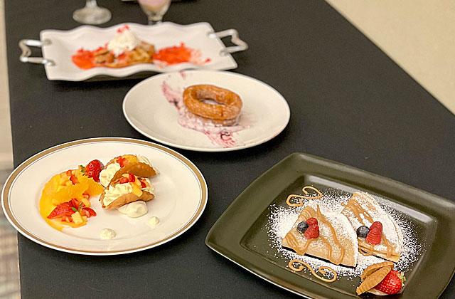 Students from Poinciana High School work with their chef mentor in the Mystery Meal competition, to demonstrate their skills in plate presentation as well as cooking. PHOTOS/DEBBIE DANIEL