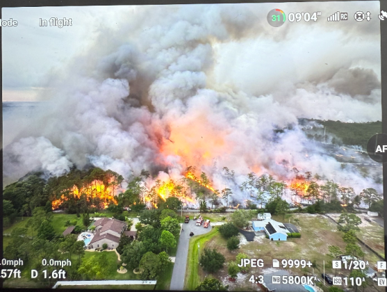 Florida Forestry Officials extended containment lines throughout Saturday to keep destructive flames away from nearby homes. (Photo/Josh Meyers)