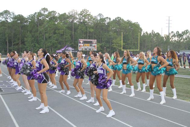 The ROAR cheer squad of the NFL’s Jacksonville Jaguars surprised the Celebration High School cheerleaders and community at their Kickoff Classic Friday night. (Photo/Michelle Kostuch)