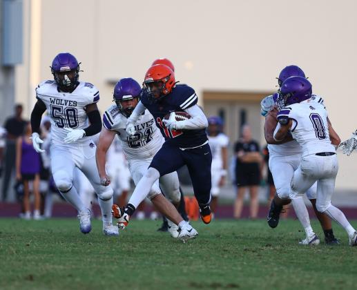 Xaevez Brown, shown here in Tohopekaliga's Kickoff Classic game against Timber Creek, had 197 total yards of offense and three touchdowns in a big District 7A-10 win Thursday over Harmony, 28-16. (Photo/Taylor McFee)