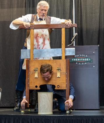Magician Dan Stapleton astounded the crowd with his wonders. He included St. Cloud Mayor Chris Robertson in the act, who was gracious enough to climb into the guillotine—and climbed out fully whole as part of the show.