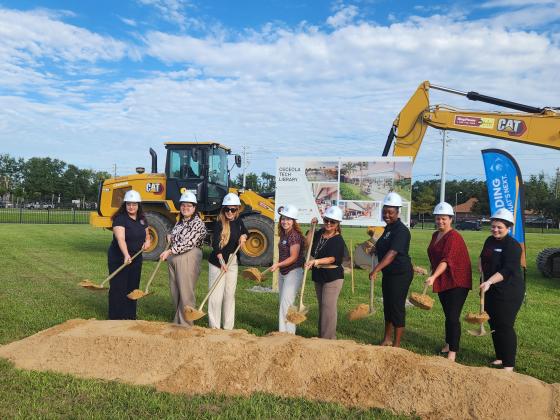 Osceola County and library leaders broke ground Wednesday on what will be a technologically-leading digital Tech Library on the grounds of the former Johnson University Florida off Bill Beck Boulevard. (Photo/Ken Jackson)