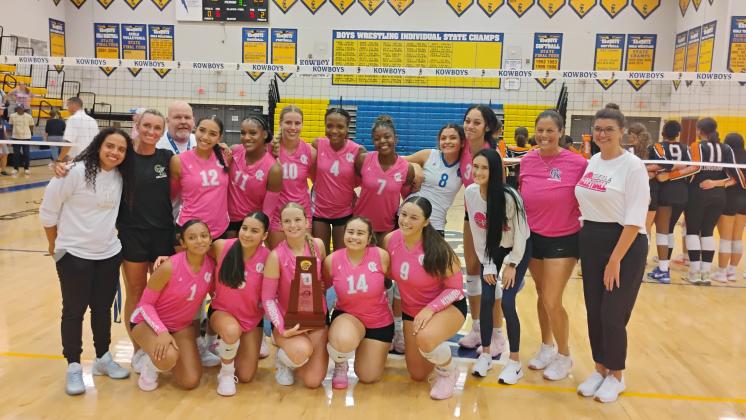 To the victors go the trophy. Osceola claimed another District 7A-7 championship Thursday with a straight set win over Harmony and will now host the regional playoffs, starting Wednesday. (Photo/J. Daniel Pearson)