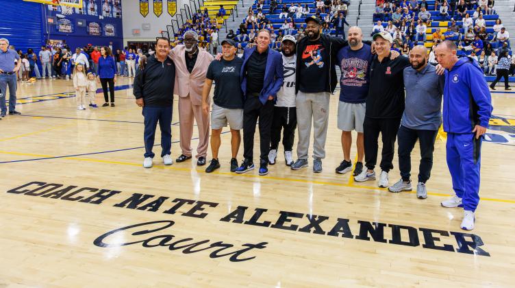 Former players and coaches turned out Tuesday as Osceola High honored former boys basketball coach Nate Alexander by naming its court in honor of the two-time Kowboys state champ . (Photo/Taylor McFee)