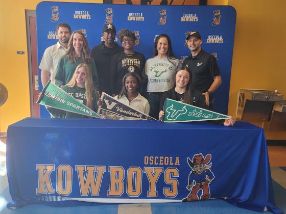 From left, Osceola High volleyball players Sophie Spivey, Jordin Southall and Cate Palmi signed scholarships at the opening of the Class of 2026 signing period. (Photo/Ken Jackson)
