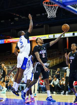 Javonte Smart (1) and Alex Morales (2) were away from the Osceola Magic for two games while playing for their home countries in the Federal International Basketball Association (FIBA) World Cup qualifying tournament. (Photos/Taylor McFee)