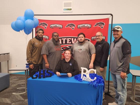 From left, GHS Coaches Isaiah Wharton, Marlin Roberts and Ryan Logan, Principal James Long and Athletic Director Travis James took part in Collin Anderson's scholarship signing Friday. (Photo/Ken Jackson)