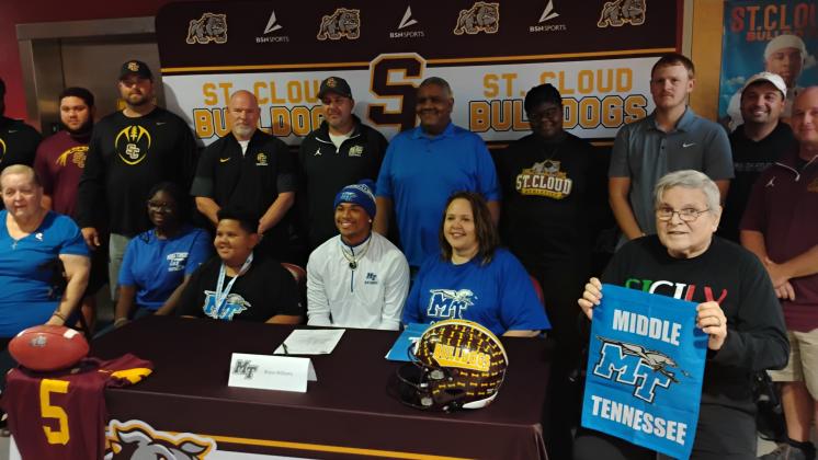 Coaches, family and friends turned out Wednesday as two-way player Bryce Williams signed on to play at Middle Tennessee State next year. (Photo/J. Daniel Pearson)