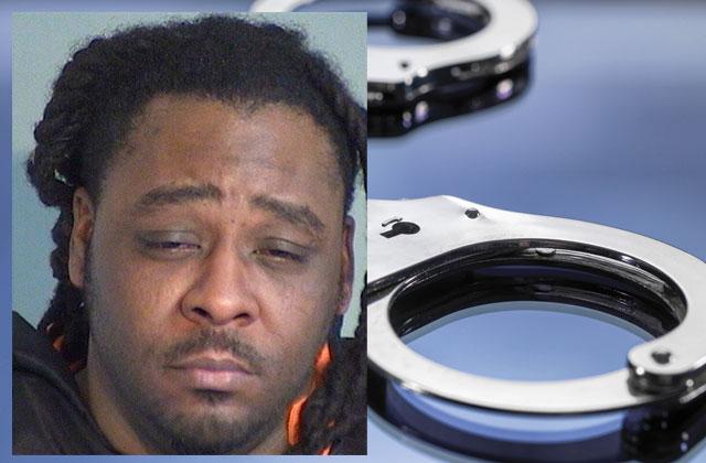 Reynard Tyrone Hough, 33, was arrested Saturday and charged with child neglect with great bodily harm after Sheriff's detectives noted he fell asleep holding a toddler in a hot tub who was later died. (Mugshot/Osceola County Jail)