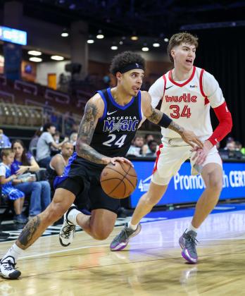 Osceola Magic guard Lester Quinones, shown in the team's home opener, led the team with 25 points Monday and was clutch in the fourth quarter as the Magic started a six-game home stand with a 112-109 win over the Toronto Raptors 905 and seized first place in the NBA G League. (Photo/Taylor McFee)
