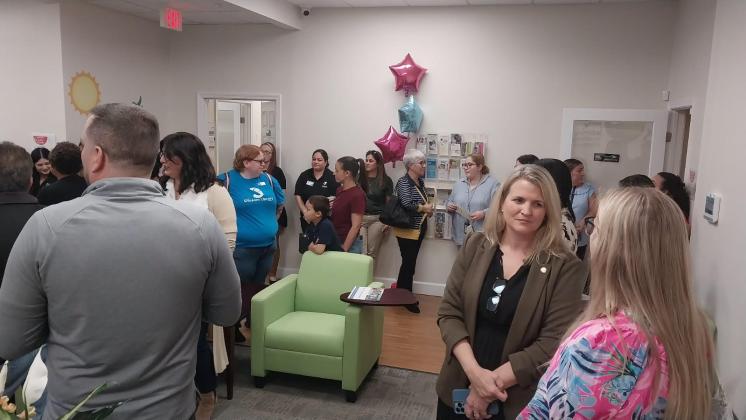 Local education and government leaders turned out for Thursday's ribbon cutting for the Early Learning Coalition of Osceola County's new working and office space. (Photo/Emely Albelo)