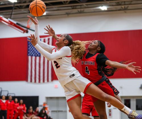 Ashlynn Day scored 20 points, grabbed 12 rebounds and dished three assists — and had to work for them all — in a 51-46 district championship clinching win Friday over New Smyrna Beach. (Photo/Taylor McFee)
