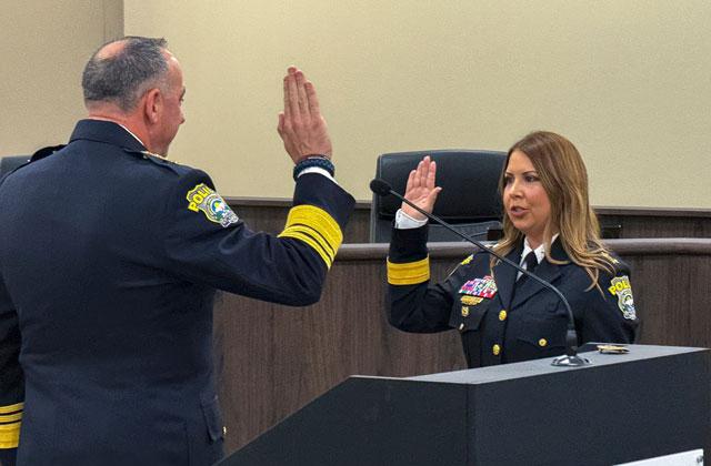 St. Cloud Police Chief Doug Goerke swears in Capt. Denise Roberts to be the agency's first female Deputy Chief at a City Hall ceremony Friday. (Photo/St. Cloud Police)