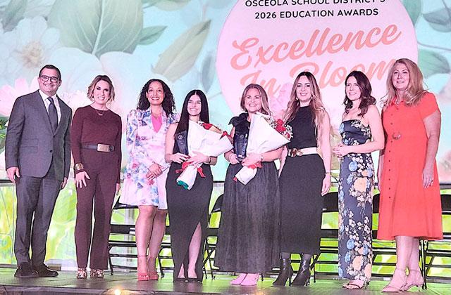St. Cloud Elementary School paraprofessional Jessica Mintz (left, with flowers) was named the Osceola County School District School-Related Employee of the Year, and Harmony Middle School’s Kyndall Brown (right) was named its Teacher of the Year at the 2026 Education Awards Friday at Osceola Heritage Park (Photo/Katie Williams)