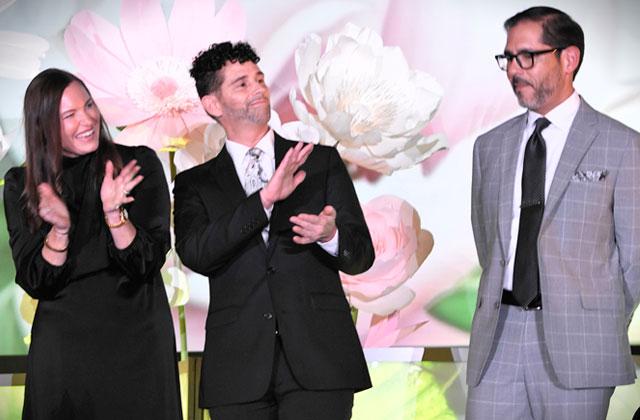Assistant Principal of the Year nominees (from left) Amanda Yontz of St. Cloud High and David Kane of Kissimmee Elementary applaud as Frankie Francheschi of Denn John Middle is announced as the award winner. (Photo/Katie Williams)