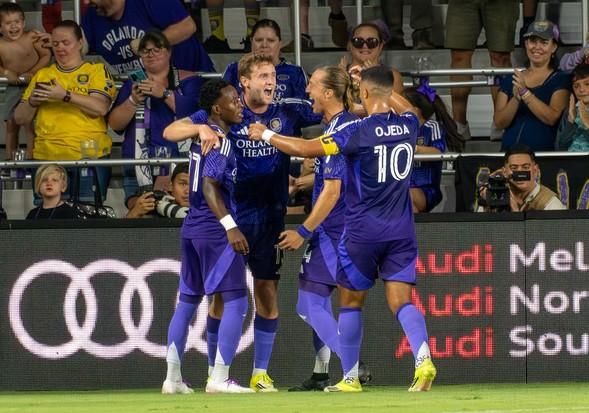 Duncan McGuire and Ivan Angulo celebrate their first goal and assist of the season in Orlando City's 2-1 win over FC Montreal. (Photo/Mario Casamalhuapa)