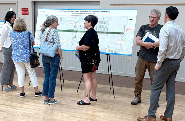 Tohopekaliga Road area residents review proposed road improvements with county transportation staff and project consultants Thursday night in St. Cloud. (Photo/Terry Lloyd)