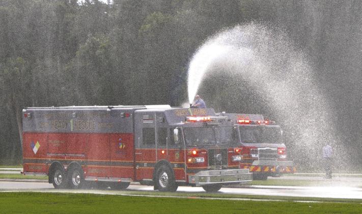 Heavy Rescue 1h got an official wet welcome when it officially went into service Thursday. (Photos/ Osceola County)