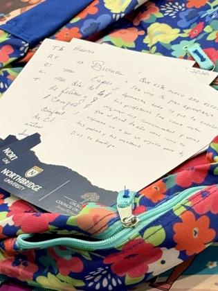 The notes and school supplies will fill backpacks that Northbridge University will give out at their Back-to-School Event on August 1. (Photo/Debbie Daniel)