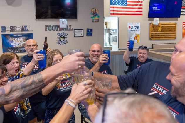 Kirk Zilke raises a glass to his moving on to a runoff for St. Cloud Seat 5. (Photo/Taylor McFee)