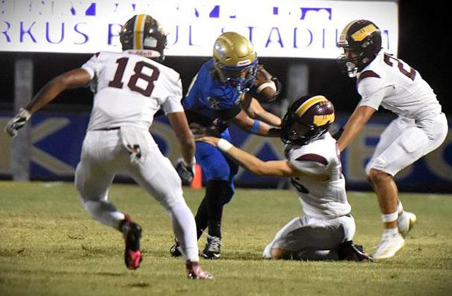 Osceola used a huge second half to record its 15th win in a row over St. Cloud in 44-7 fashion. (Photo/Katie Williams)