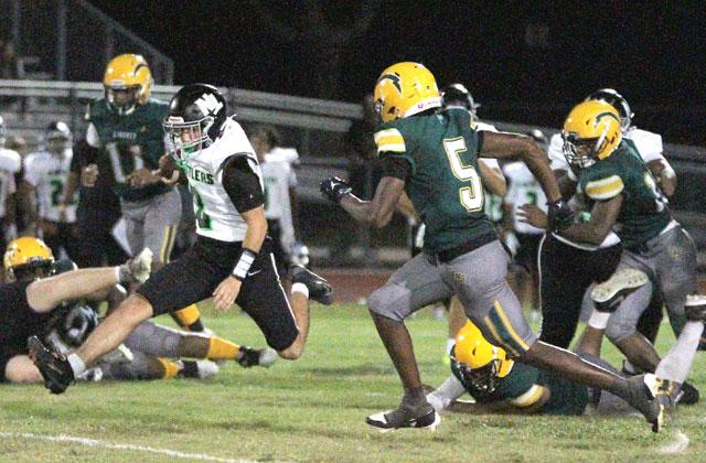 Nova Lakes tailback Jaden Dionisi ran for 203 yards and two touchdowns is the Rattlers’ first ever win Friday, a 25-0 victory over Liberty. (Photo/Michelle Kostuch)