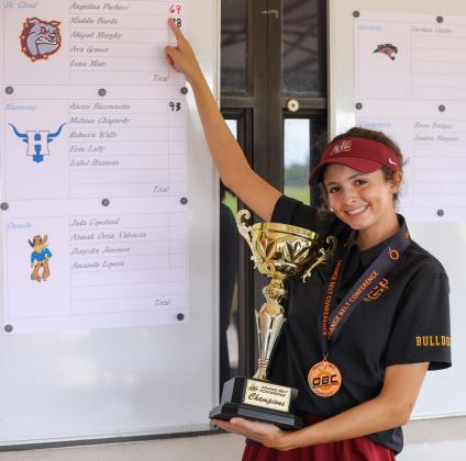 A really red, or maroon, number: St. Cloud's Angelina Pacheco won the OBC girls individual title with a solid 3-under 69. (Photo/Taylor McFee)