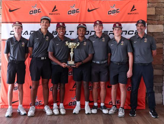 St. Cloud's boys copied the girls' success on Wednesday to win the team titles; center is co-medalists Arnold Pouncy and Ayden Febres who each shot 67. (Photo/Taylor McFee)