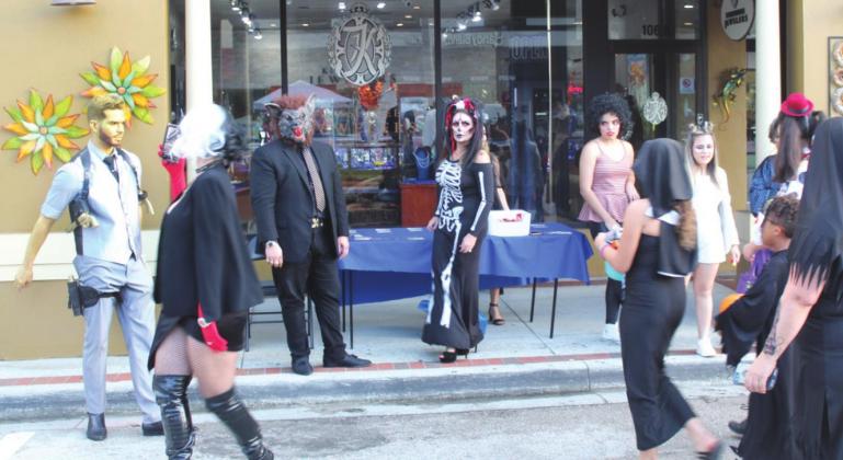 Downtown Kissimmee merchants got in the spirit, giving out candy at Boo! on Broadway