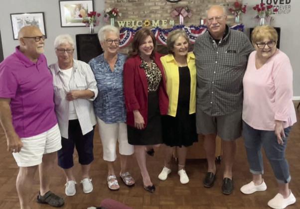 Rep. Paula Stark with residents of Sugar Mill Mobile Home Park. PHOTO/DEBBIE DANIEL