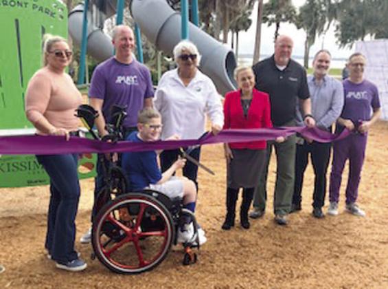 Kissimmee city officials Friday cut the ribbon on a first-of-itskind inclusive children’s park by the Lakefront. PHOTOS/DAVID CHIVERS