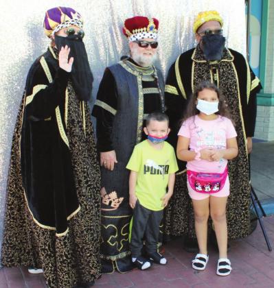 Hundreds of children and families gathered Sunday at Old Town to celebrate Three Kings Day, an annual local event sponsored by the Kissimmee/Osceola Chamber of Commerce. PHOTOS/TERRY LLOYD