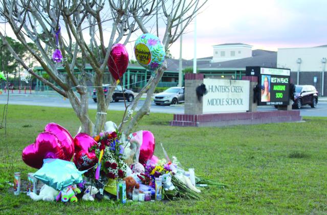 A somber memorial is in place at Hunter’s Creek Middle School, where the school remembers 7th grader Madeline Soto of Kissimmee. PHOTO/KEN JACKSON